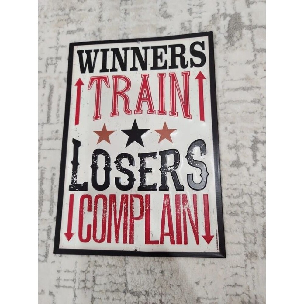 Winners train losers complain metal sign